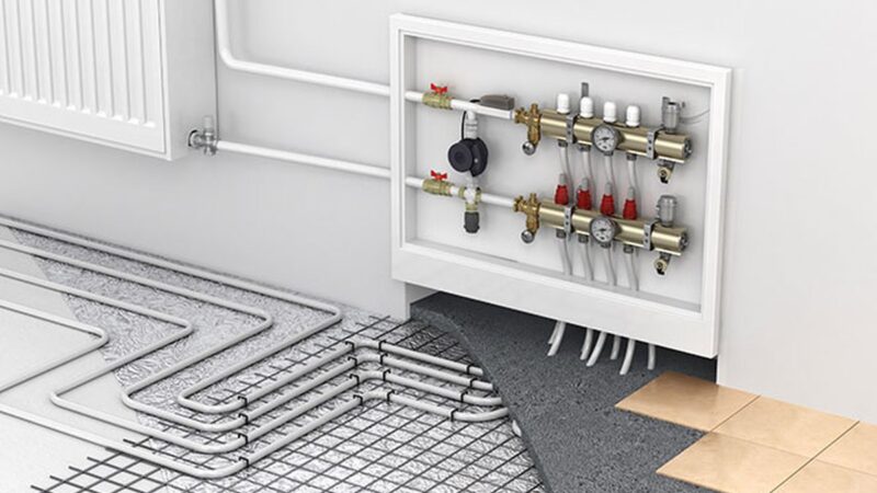 Termostato con impostazioni di temperatura per il riscaldamento domestico.